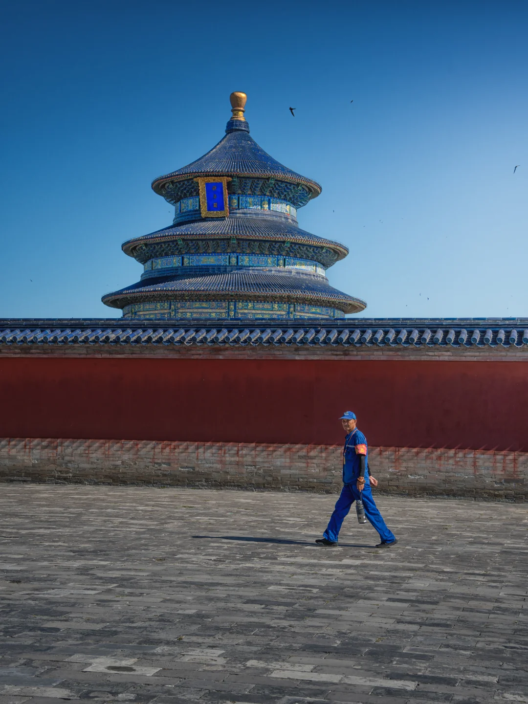 Sunlight casting soft shadows inside Beijing temple courtyard