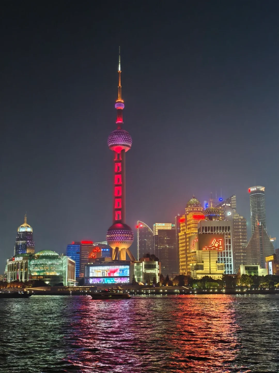 Bustling Shanghai street at night with food stalls