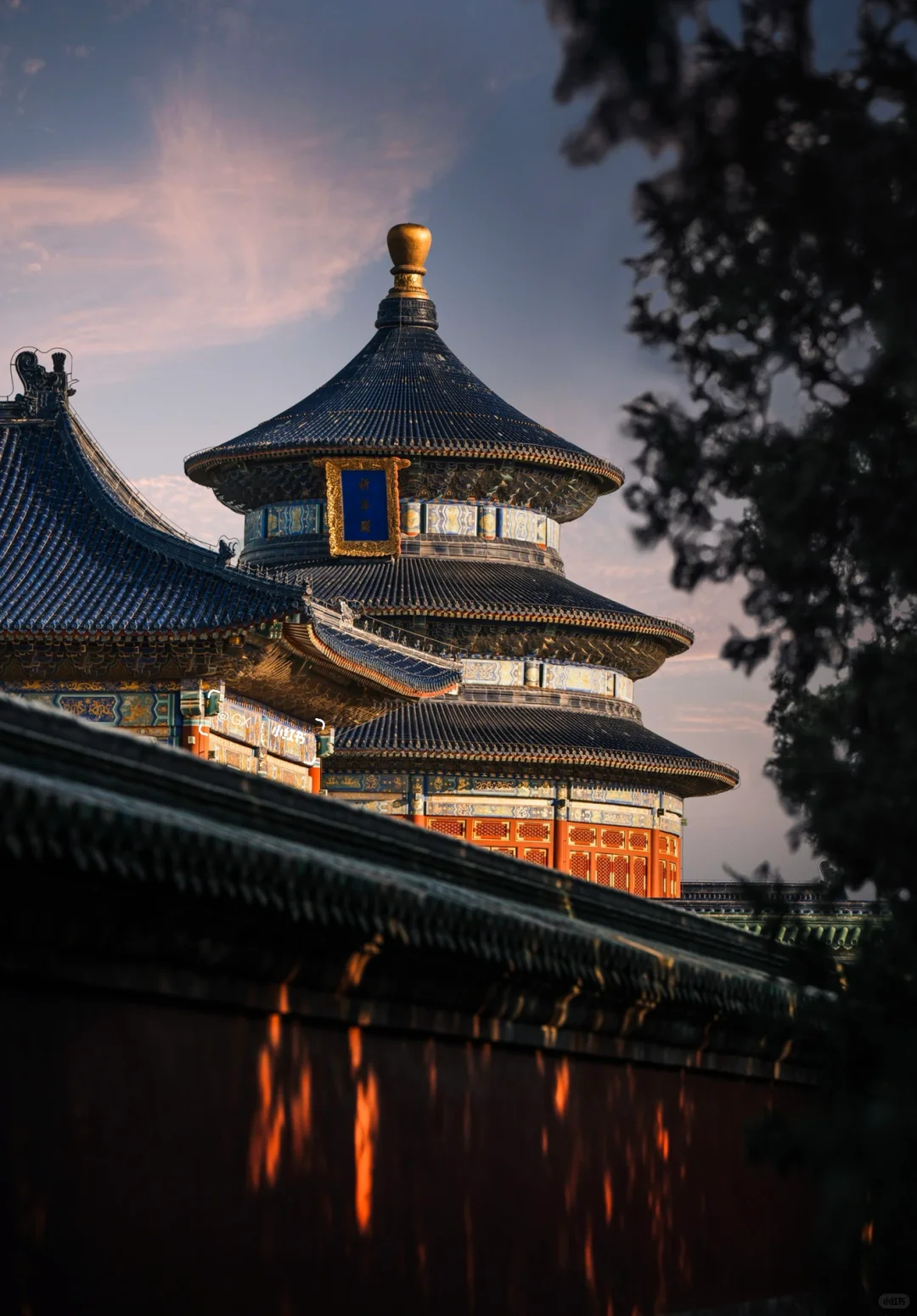 Traditional temple building framed by trees in Temple Park