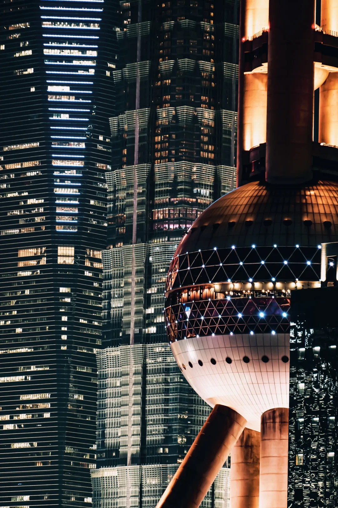 Night scenery at North Beach Shanghai showing gleaming river and city lights