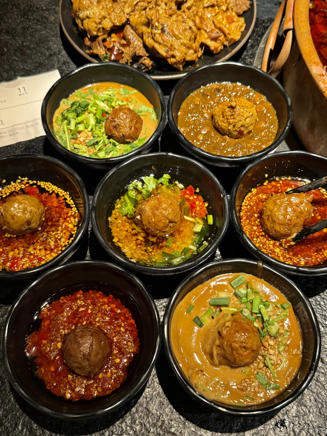 Spicy beef hotpot served with fresh ingredients