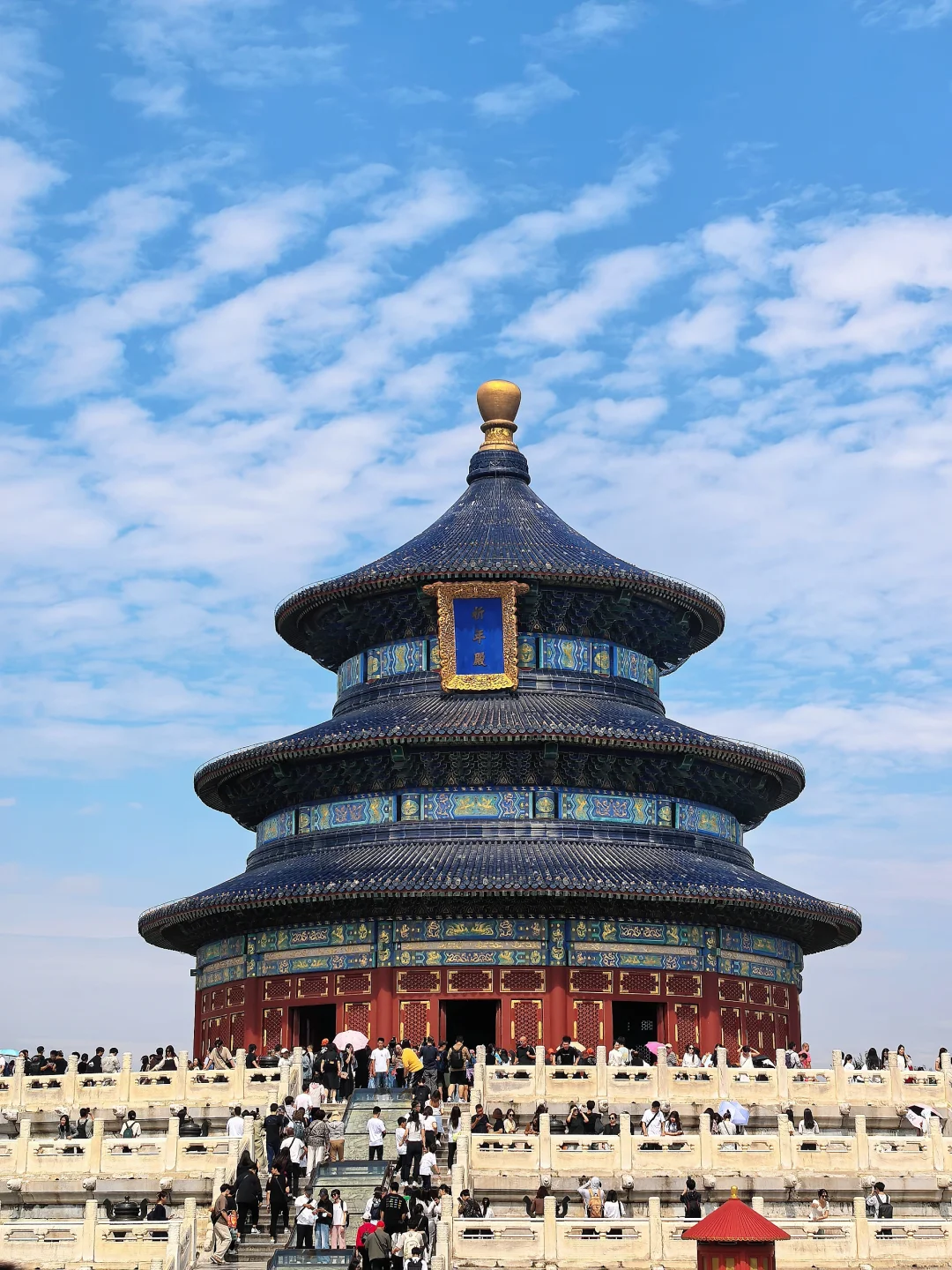Close-up of red wall and blue tiles of the temple