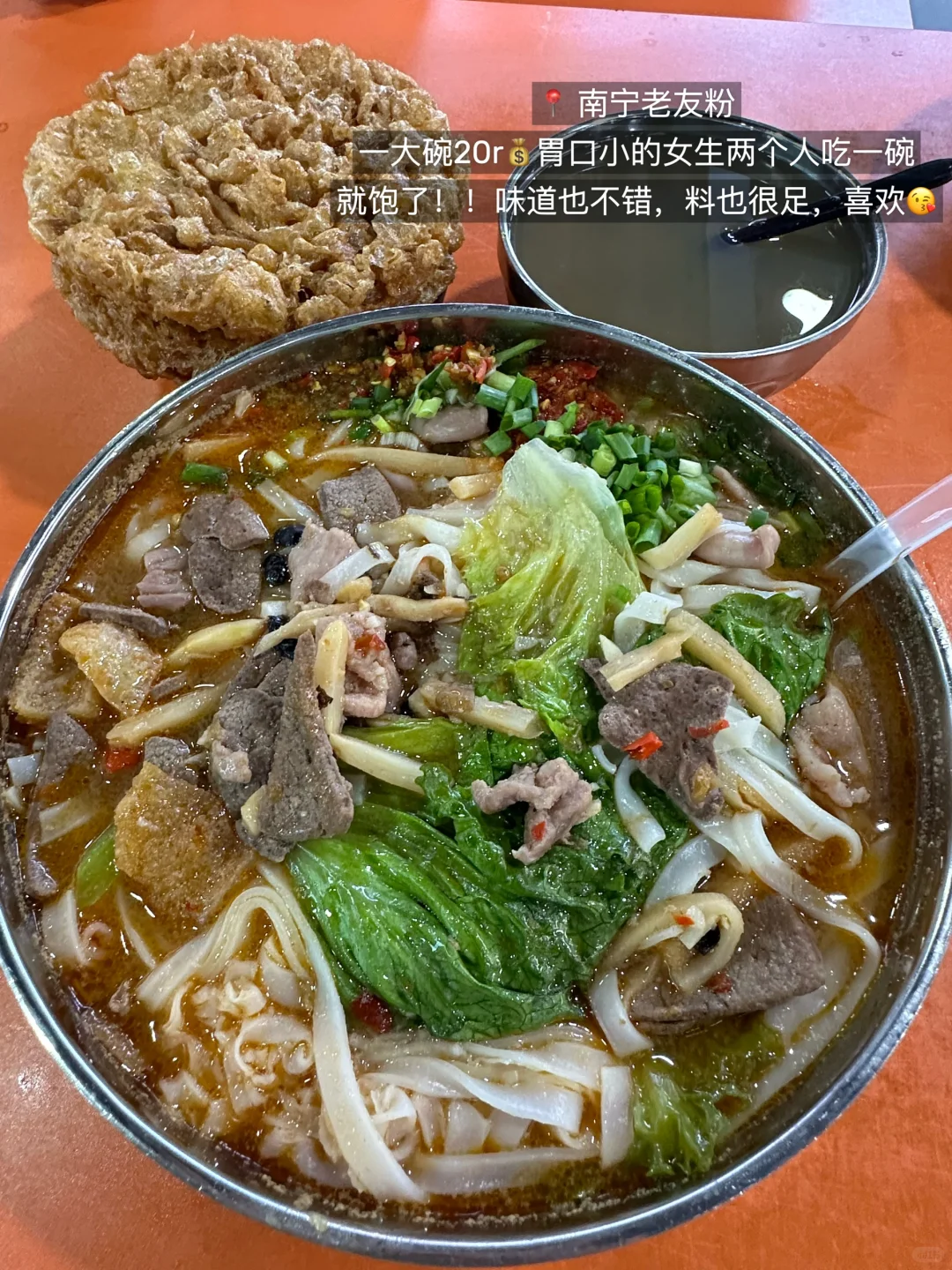 Colorful spread of Beijing cuisine on a wooden table