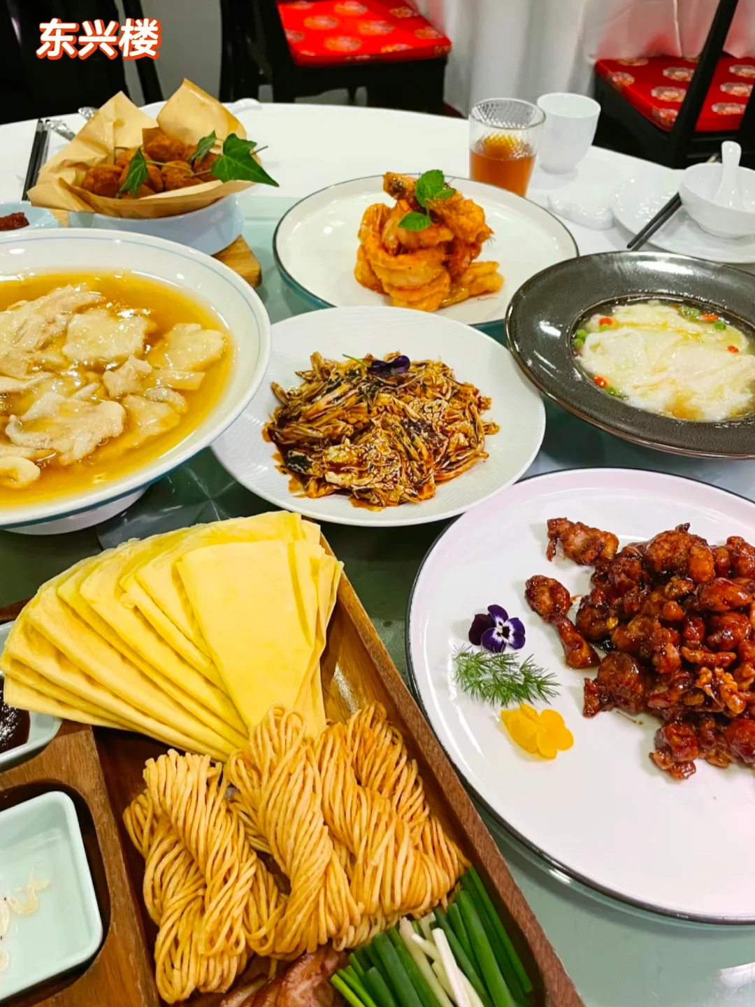 Interior of the traditional Beijing restaurant with wooden tables