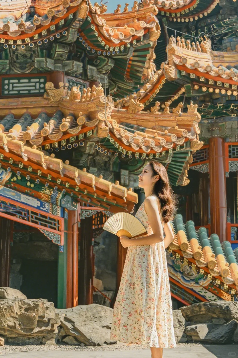 Evening lights highlight the rooftops of Beijing temple